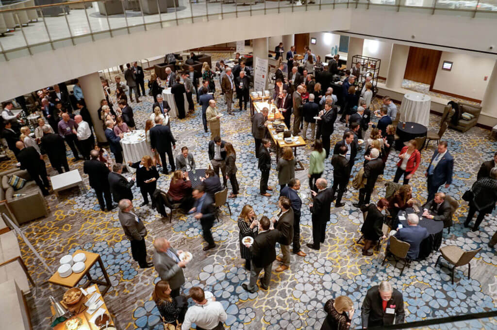 NAST conference reception room, participants mingling